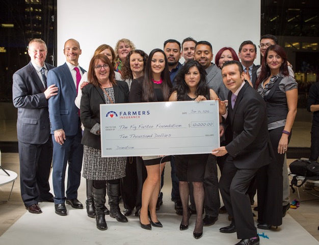 Surrounded by local agents and representatives, Jacqueline Camacho-Ruiz,  center, accepts this $10,000 check from Farmers Insurance during the Fig  Factor Foundation Official Launch and Fundraiser.