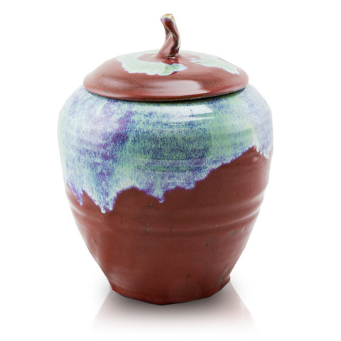 Hand made and kiln fired ceramic cremation urn with a capacity of up to 200 cubic inches.