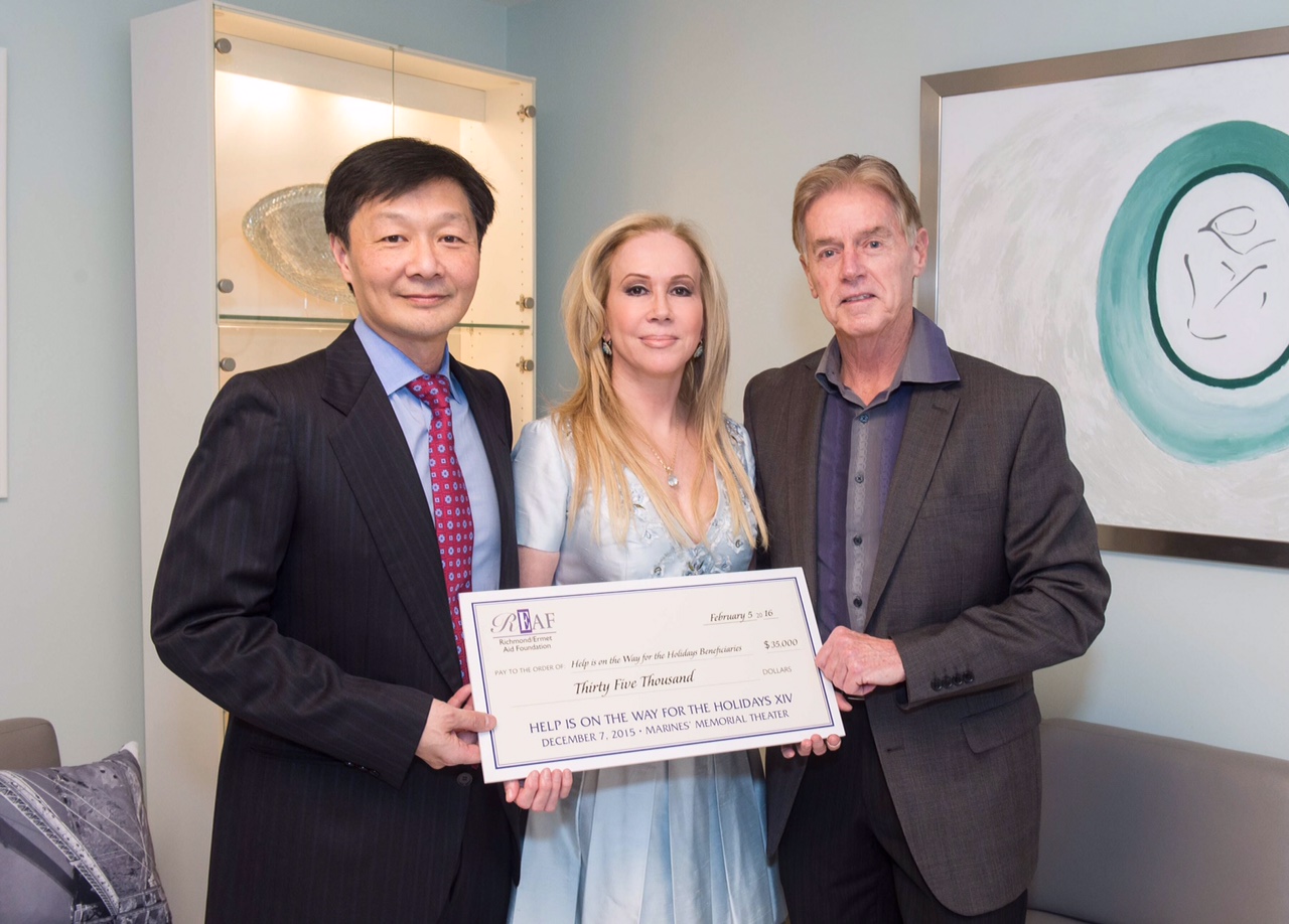 Dr. Albert W. Chow, Sophie Azouaou and Ken Henderson presenting beneficiary check