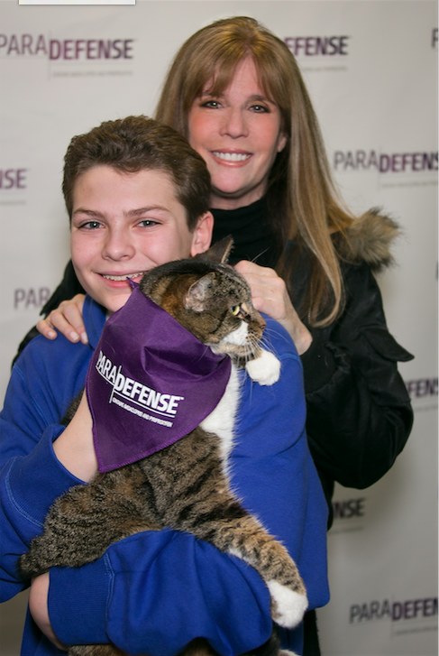 Jill Rappaport at the Southampton Animal Shelter with a shelter volunteer at the ParaDefense shelter event.