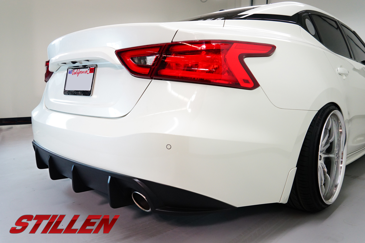 The Stillen rear diffuser adds some aggressive styling to the rear end of the 2016 Nissan Maxima.