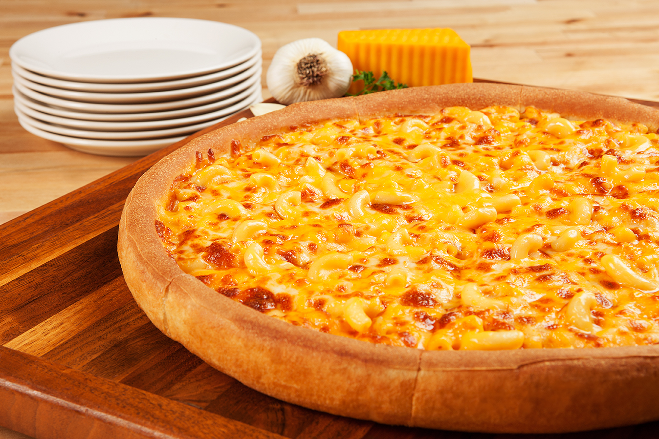 The Mac & Cheese Pizza is available at participating Godfather's Pizza locations through April 24, 2016.