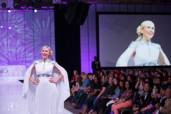 Her Universe Founder Ashley Eckstein on the runway from last year's Her Universe Fashion Show. Fans will get the scoop on this year's show at the WonderCon Her Universe Fashion Show panel.