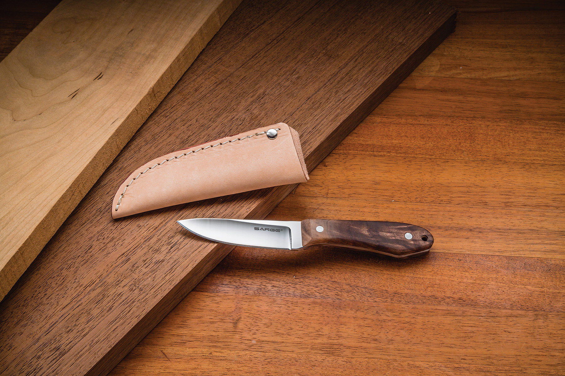 In the Custom Knife class, you will choose wood scales for the handle, then learn how to sand, shape and finish.