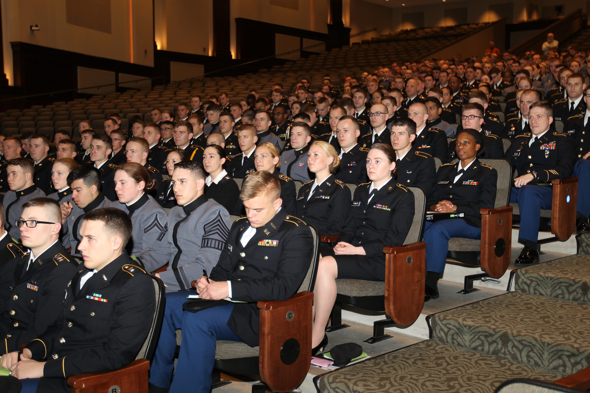 Cadet Brandy Fowler (end seat, row D) in the audience during a presentation at the George C. Marshall Leadership Conference.