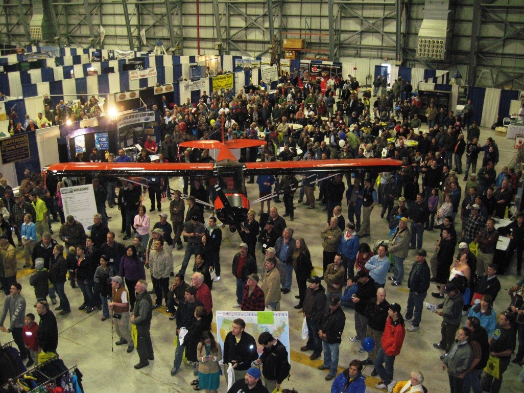 Hundreds of pilots gather around to see who wins a raffle plane in the final hour of the two-day show.