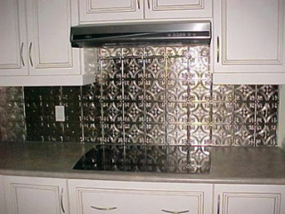 Tin ceilings can decorate a normally dull wall into an attractive back splash.