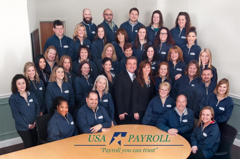 The team at USA Payroll is proudly celebrating the firm’s 20th anniversary. Pictured with owners Mary VanWyk-Fiannaca and Frank Fiannaca are the firm’s staff and sales force.