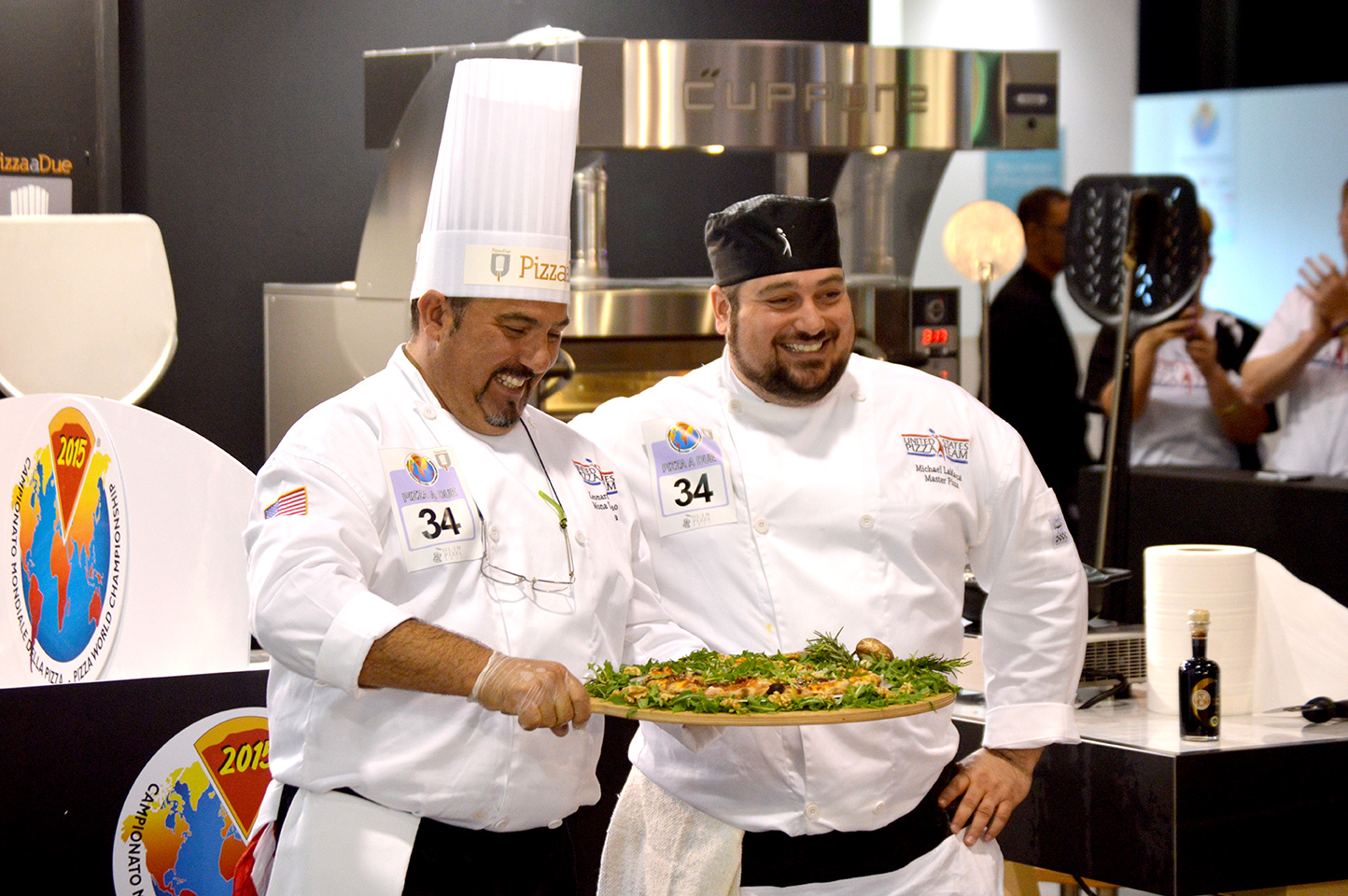 LaMarca, right, and Lenny Giordano present their pizza at the 2015 World Pizza Championships, Parma, Italy.
