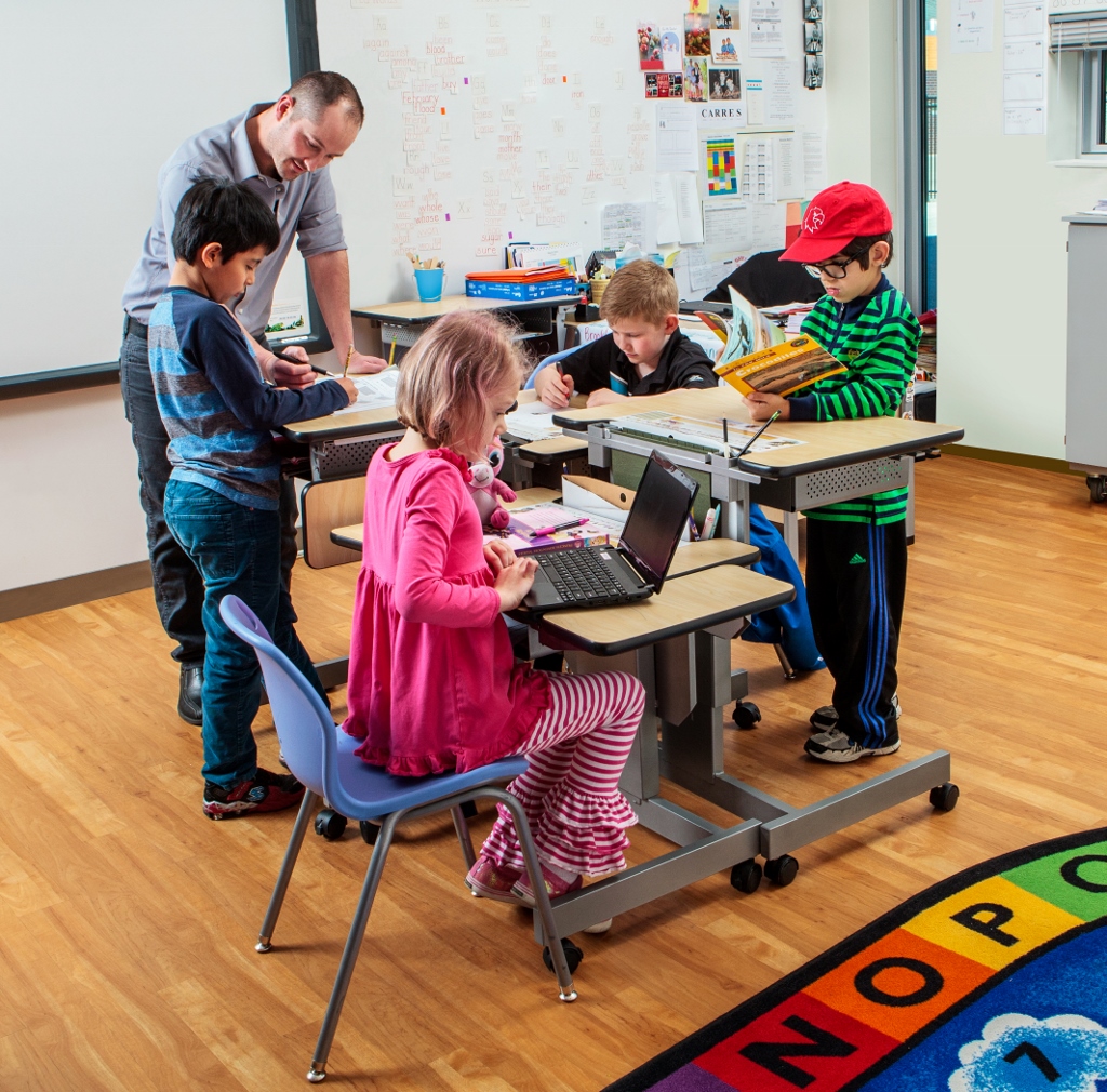 The Marvel Focus Desk, a new movement-friendly student desk, enables K-8 students to sit or stand at will. Unique design features that promote organization and concentration.