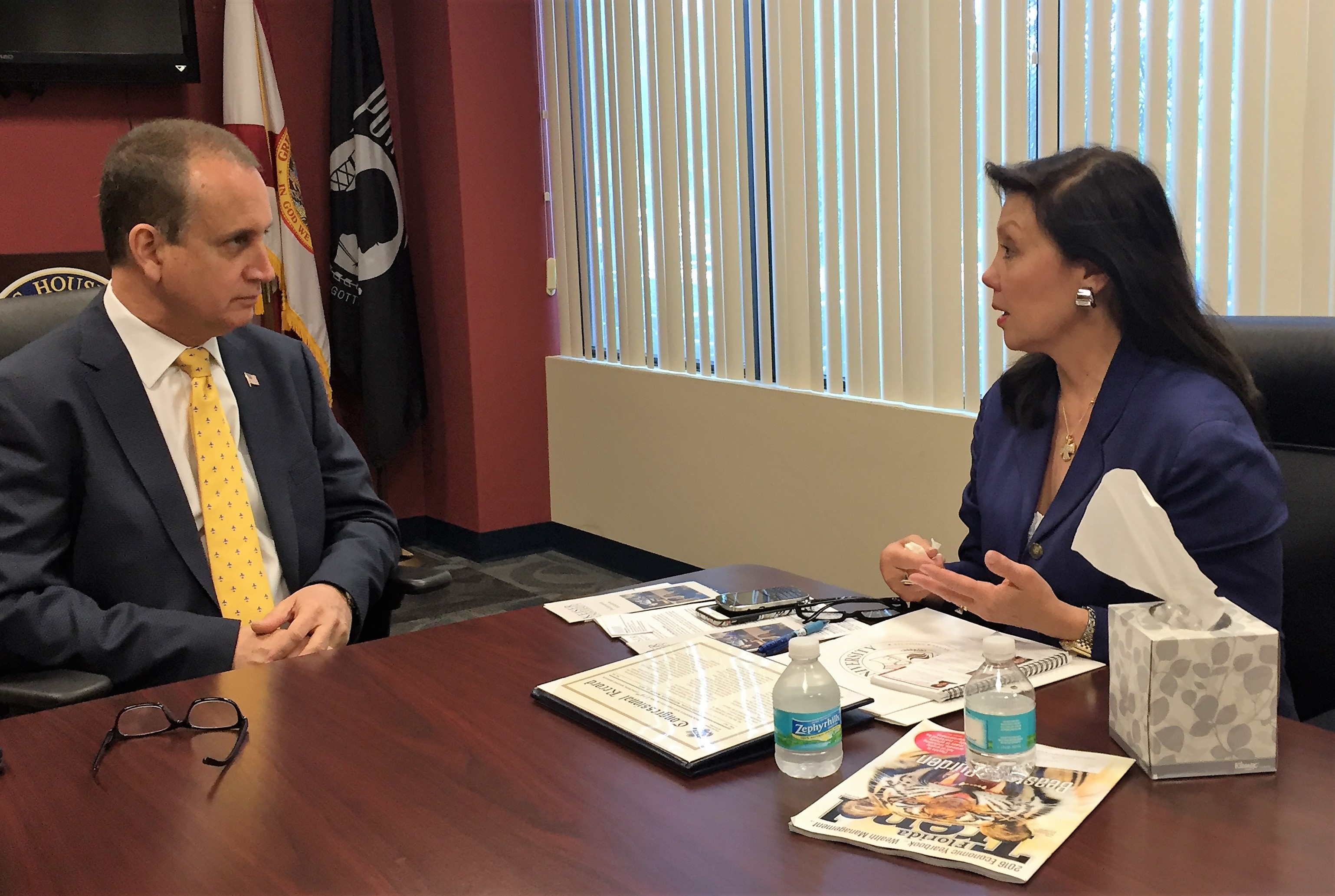 Belinda Keiser speaking with U.S. Congressman Mario Diaz-Balart