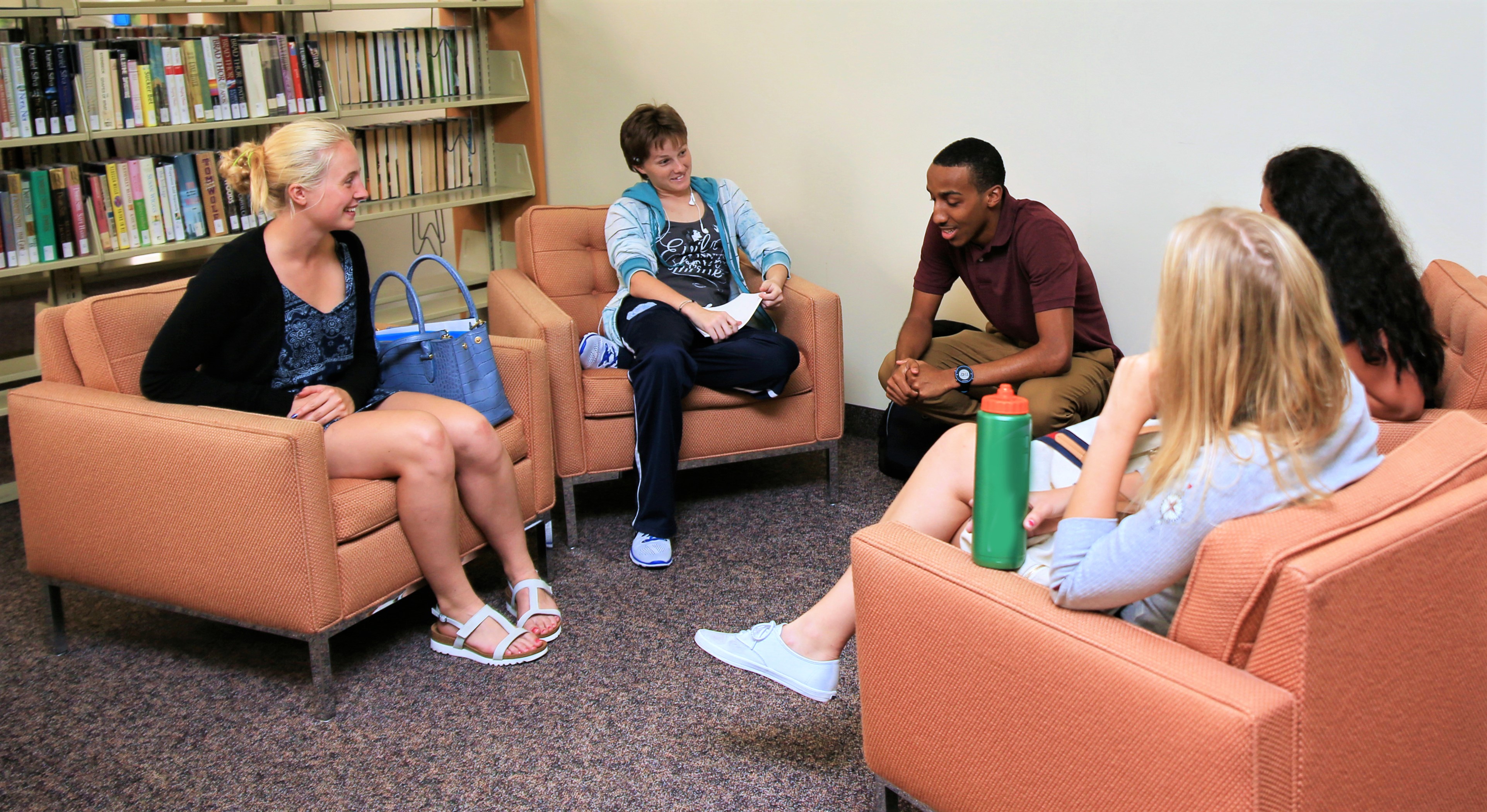 Keiser University Flagship Campus students in library study group
