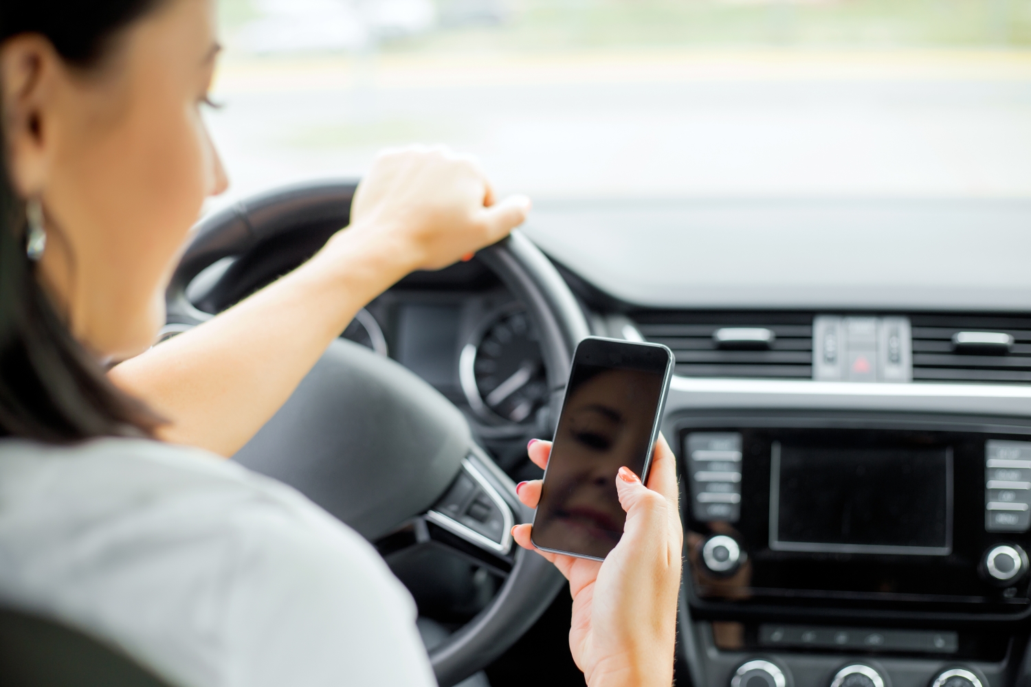 Sending a text message or answering a phone call while driving is both careless and irresponsible