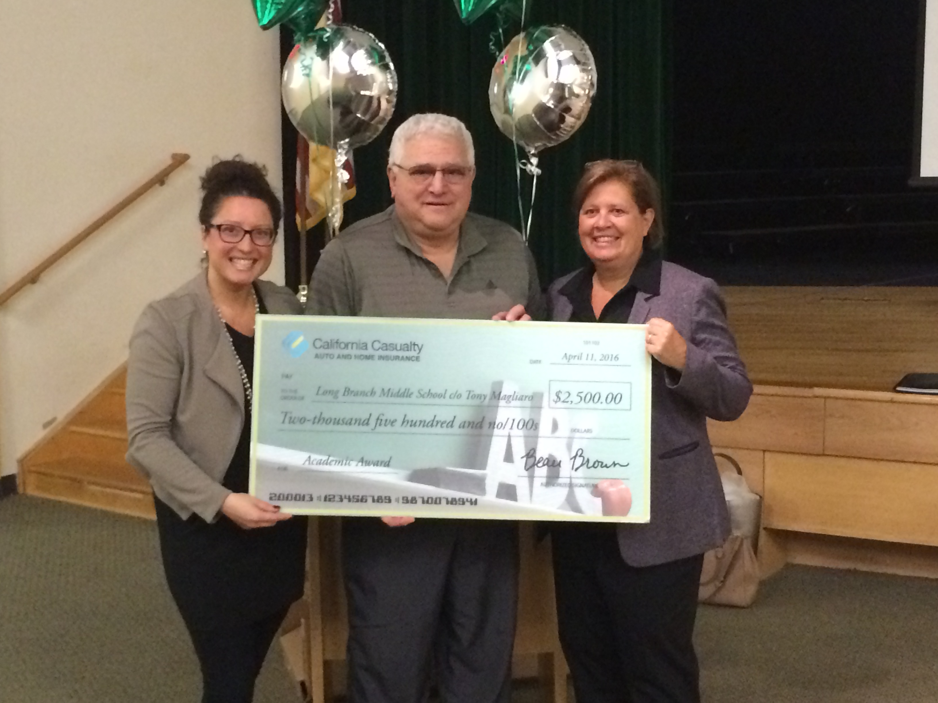 Anthony M. (center), the Most Recent $2,500 Academic Award Winner From California Casualty