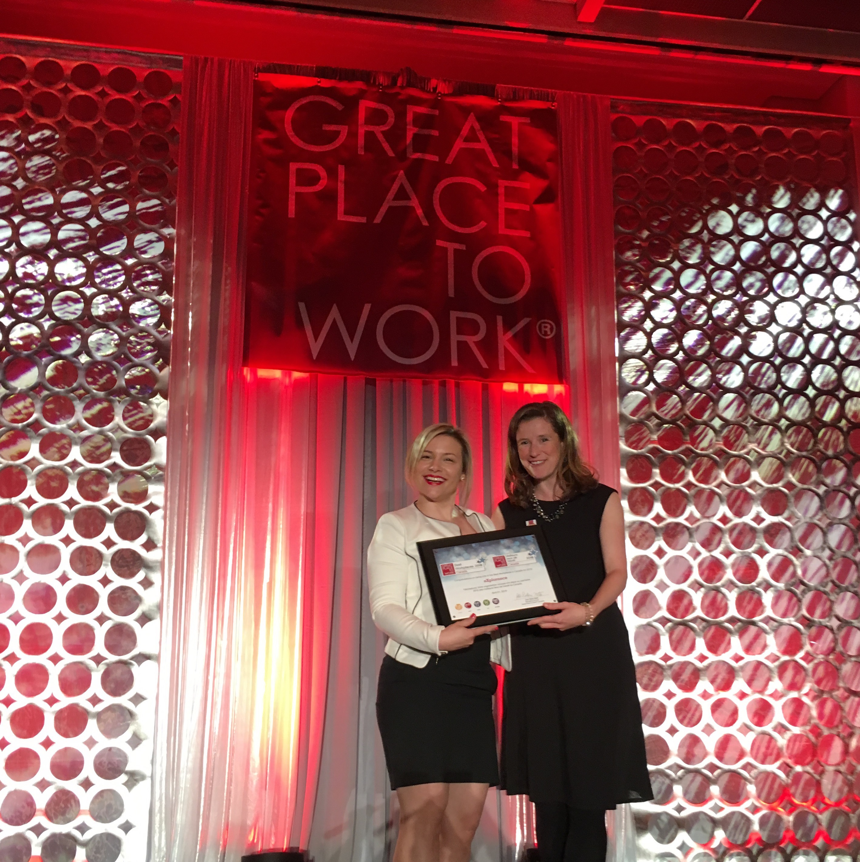 Zeljka Eyamba-Tsimat, Human Resources Manager at eXplorance, receives the 2016 Best Workplaces in Canada award.