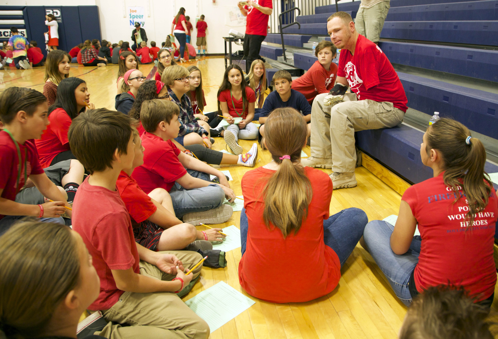 Staff Sergeant (Ret.) Mark Burleson, USMC  and students at Boot Campaign's Patriot League Rally at Garrett Junior High, Boulder City, NV.