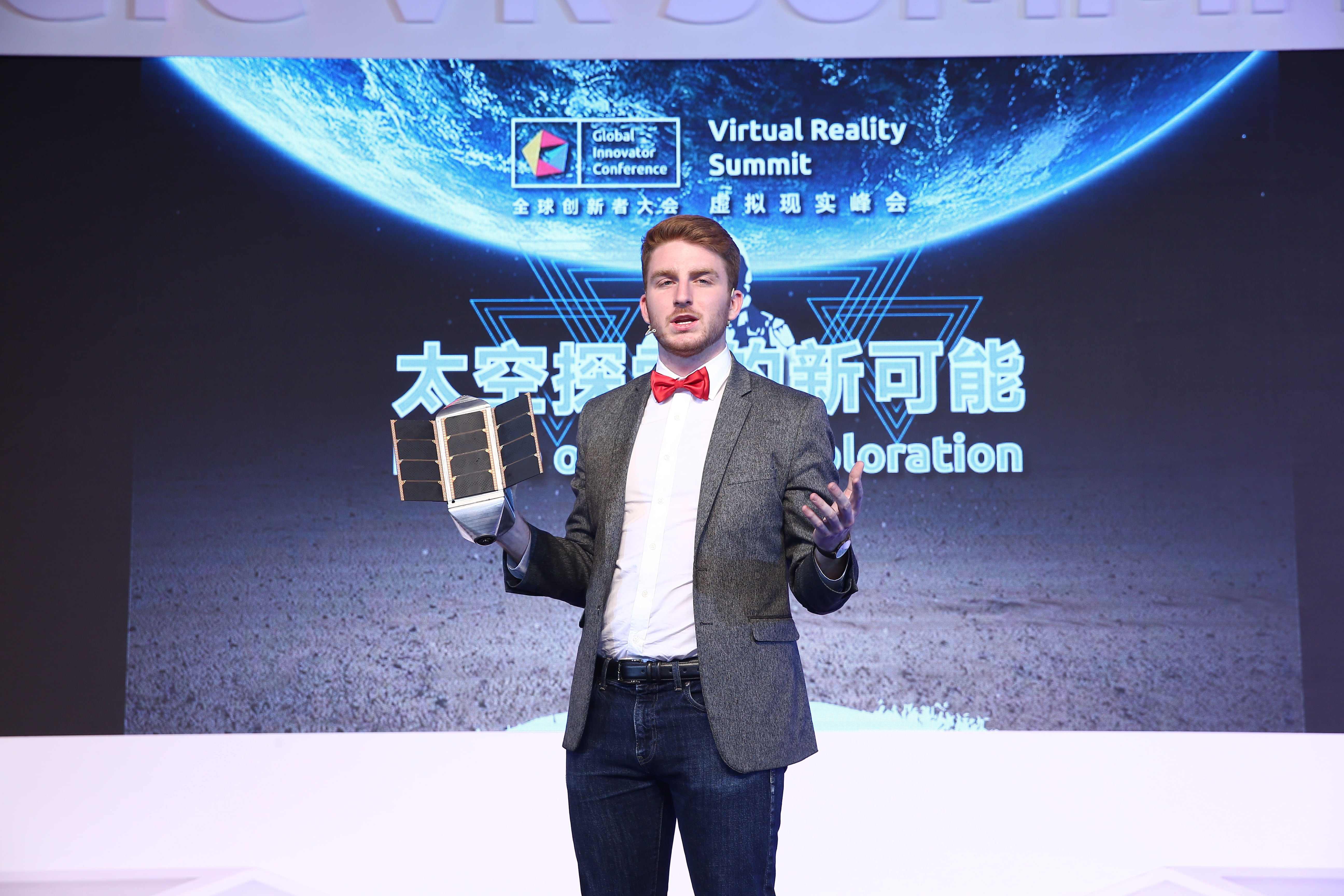 SpaceVR, CEO Ryan Holmes, holding a prototype of the worlds first virtual reality camera satellite, Overview 1.