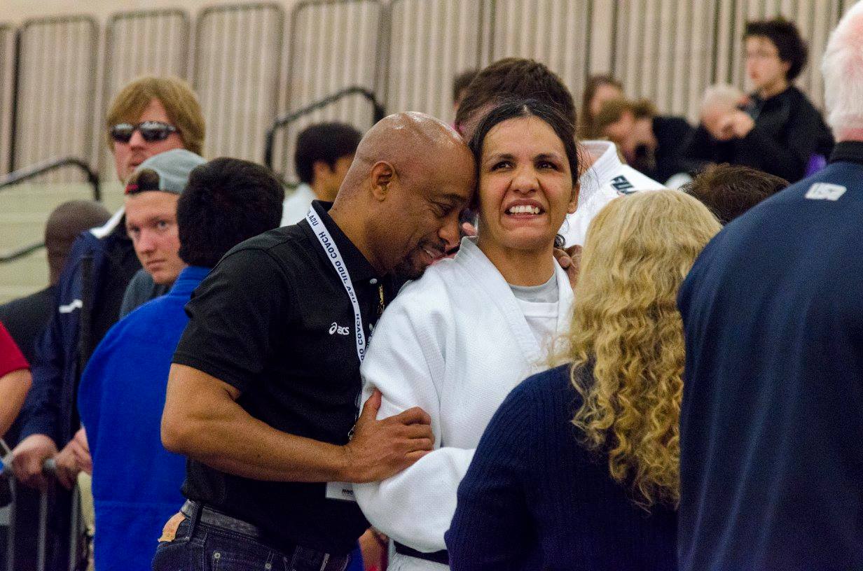 Christella Garcia being congratulated by Ed Liddie, the High Performance Coach at the Olympic Training Center after winning the Gold Medal at the Judo Nationals