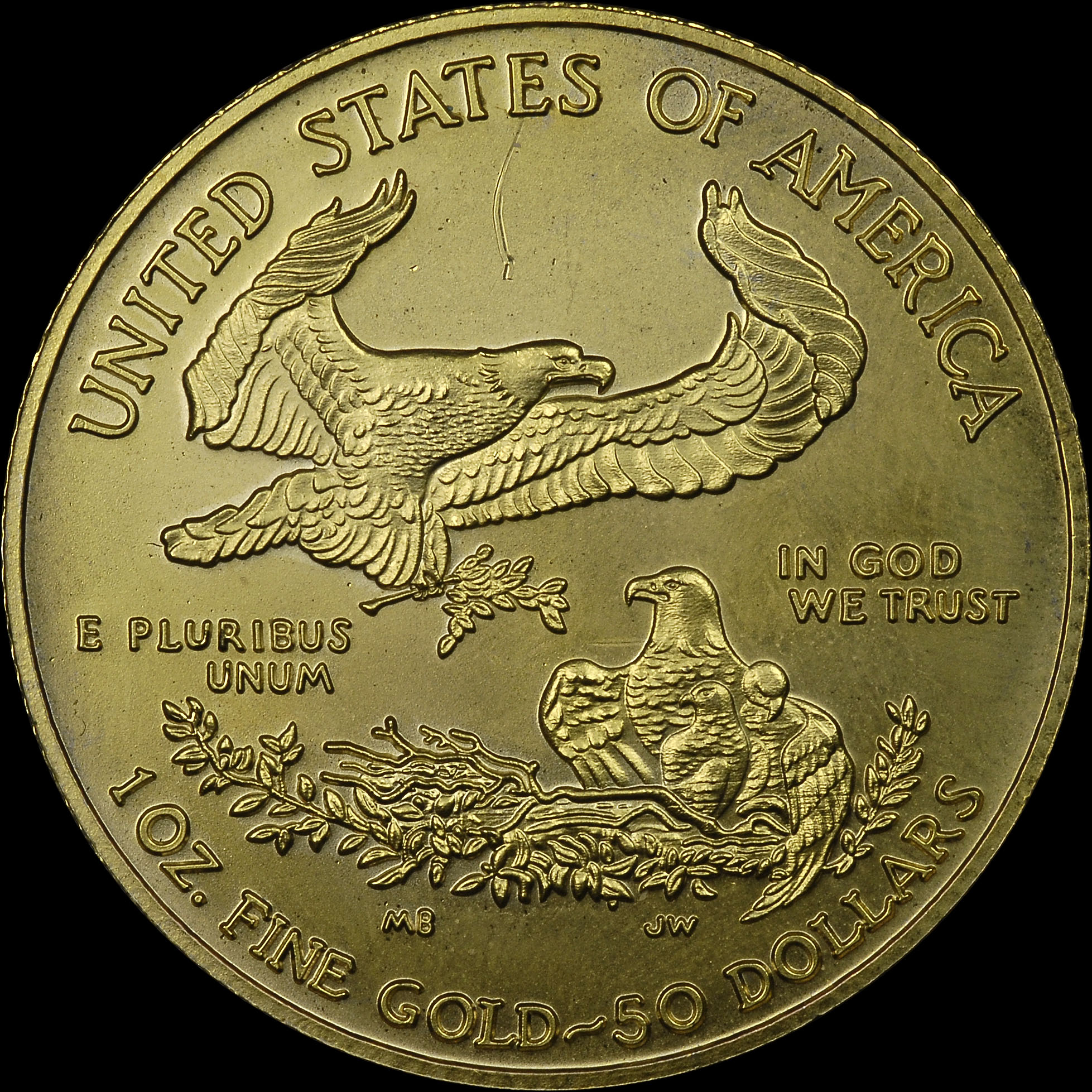 The back of a counterfeit 2012-dated American Eagle $50 denomination one-ounce gold bullion coin. (Photo courtesy of Numismatic Guaranty Corporation.)