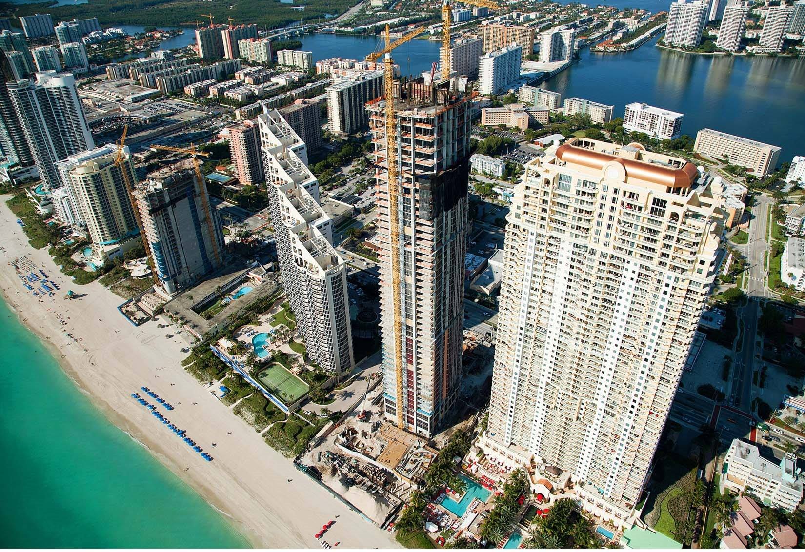 Outlook is excellent:The 46-floor Mansions at Acqualina (center tower with cranes) is Florida’s 5th tallest structure and rests on a PENETRON ADMIX-treated foundation.