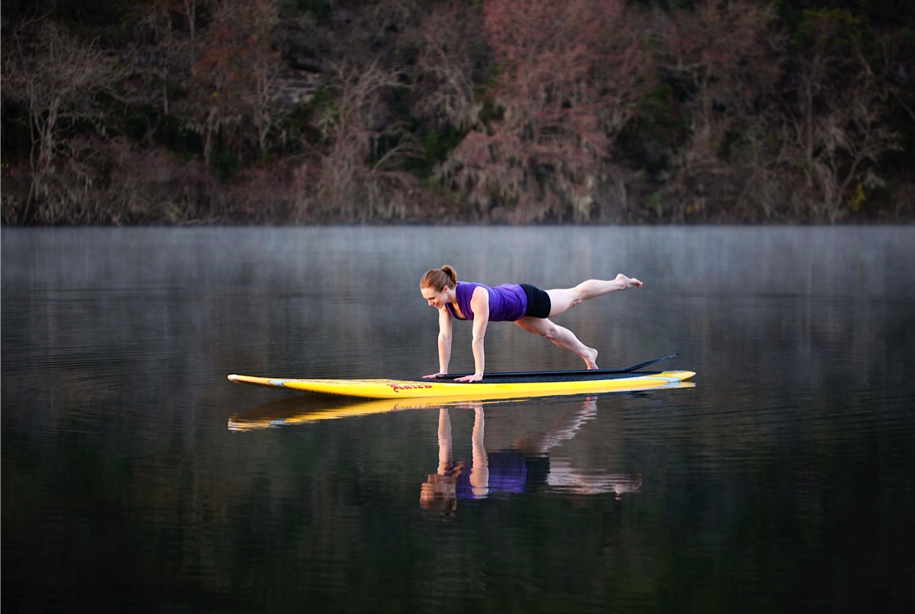 Stand Up Paddleboards are utilized for yoga, core workouts and more on Lake Austin.