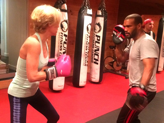 Dr. Karin Hehenberger working out with Villi Bello at Punch Fitness