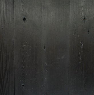 Nearly opaque, the Custom Black Finish on reclaimed Ash has a monochromatic urbane vibe. All crafted by Pioneer Millworks in their NY mill.