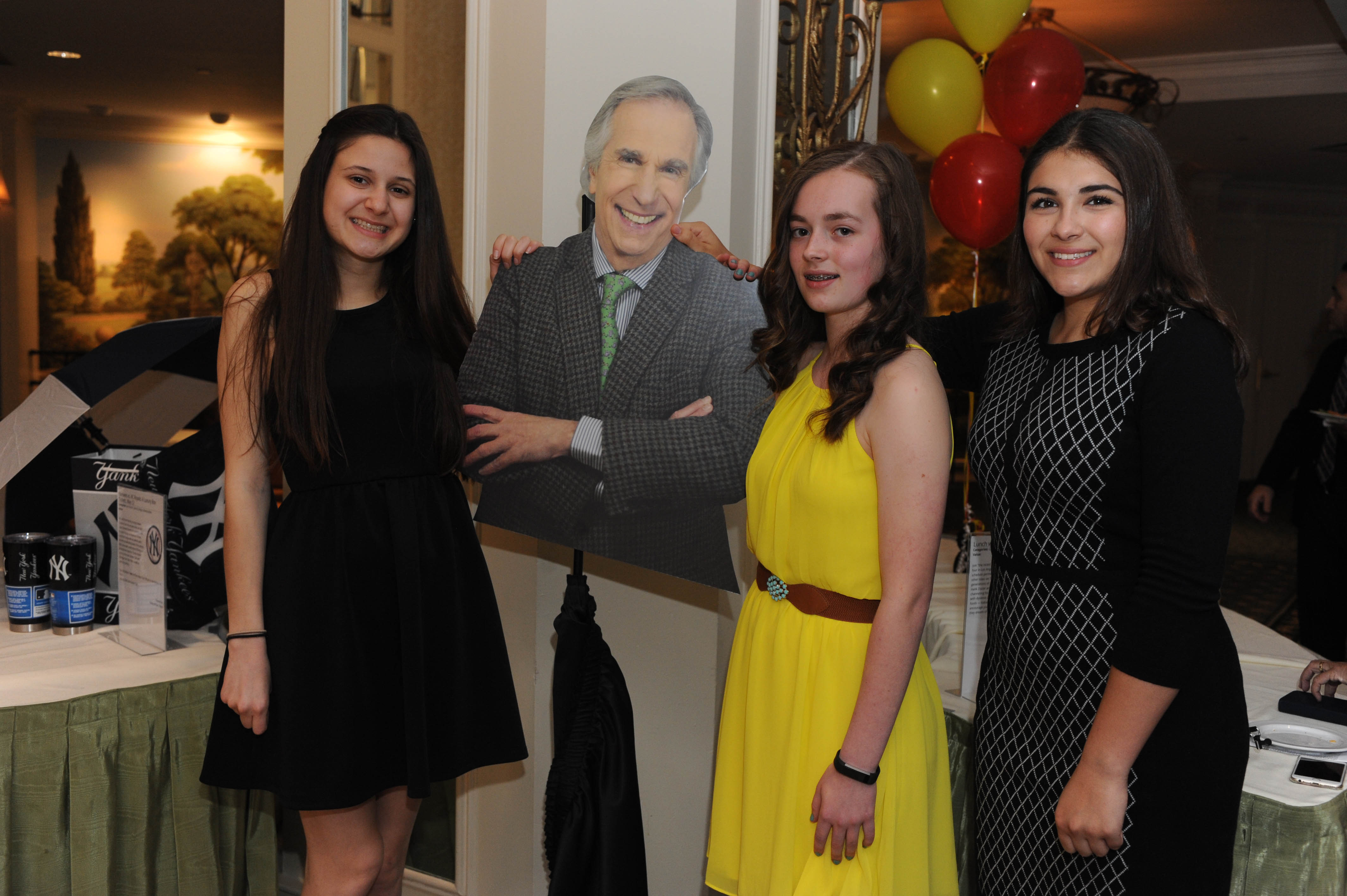SKLD Youth Achievement Award Winners having fun at the selfie station with cutout of SKLD Honorary Chairman, Henry Winkler