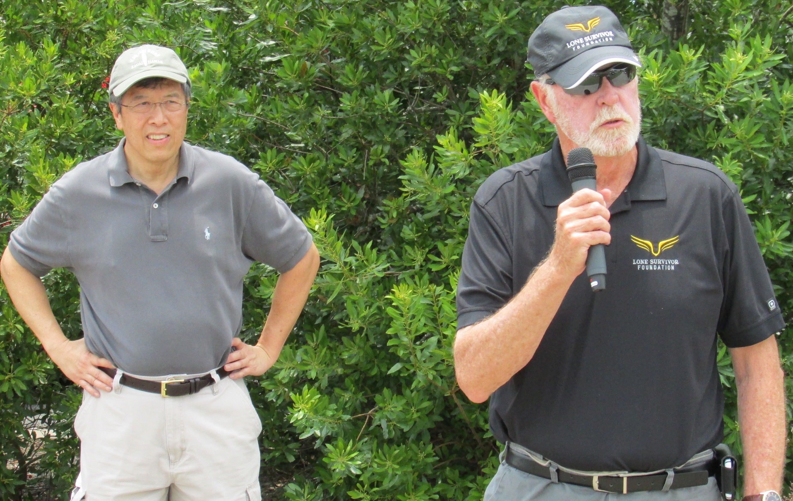 (L-R) Dr. Jimmy Lee, Vice-Chairman of the Board and Chief Operating Officer at North Cypress Medical Center accompanies Terry Jung, Executive Director of the Lone Survivor Foundation, in giving thanks