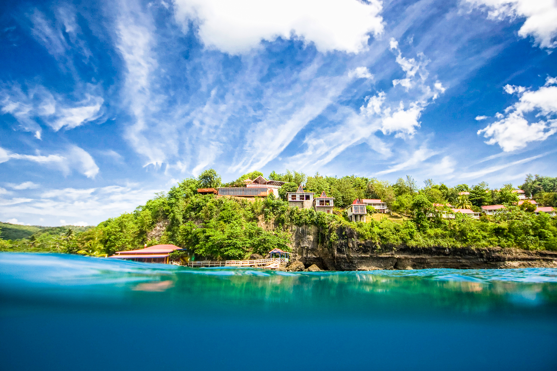 Looking up at Ti Kaye Resort & Spa from the waters off Anse Cochon.