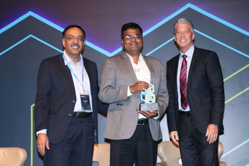 Bridge Solutions Group's Chief Delivery Officer, Anand Panchapakesan, accepts the Client Value Innovation Award