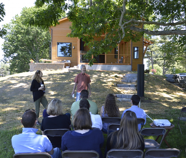 Tom Lambert and Ann Buchau, homeowners of CreekSide Net Zero Home and owners of CreekSide Energy Solutions, answered questions throughout the NESEA tour.