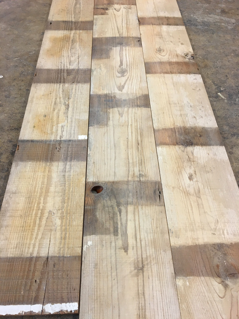 Pioneer Millworks’ reclaimed Red Pine milled into paneling for a major retailer – the boards are cleaned, wire brushed, and coated with a matte poly finish.