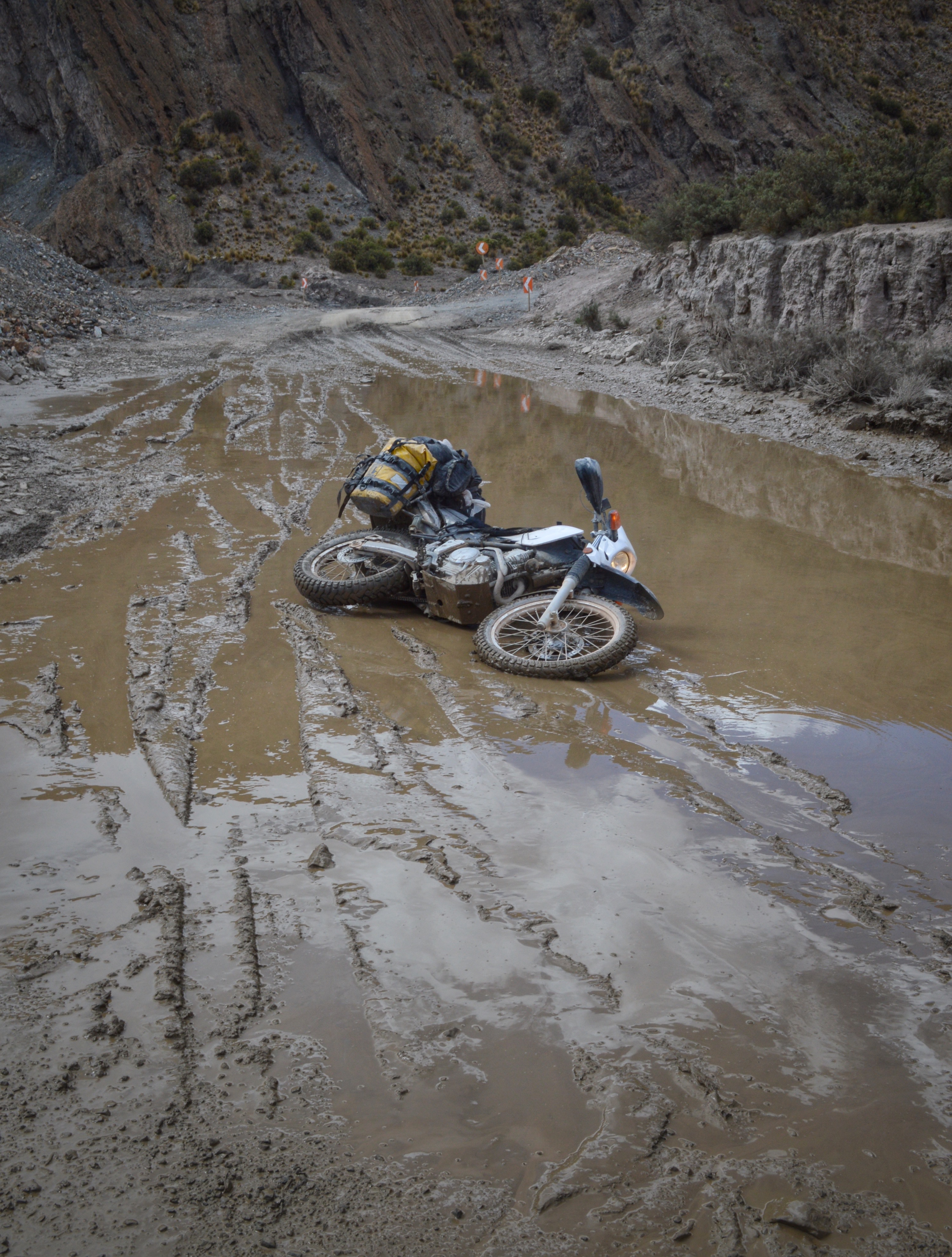 Johnson's motorcycle down in mud on Carretera Uyuni Tupiza