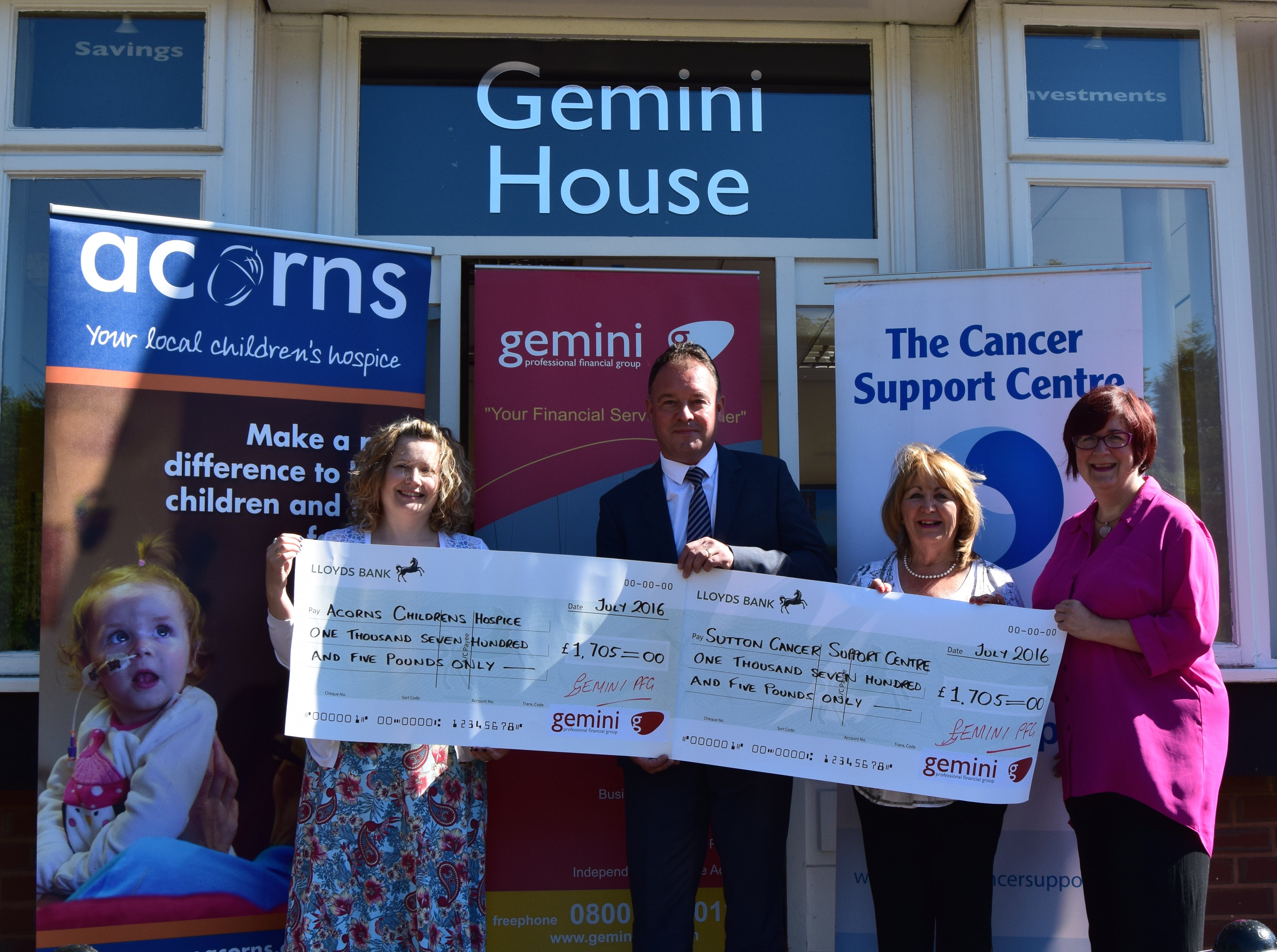 Gemini Director, Jason Moore presents cheques to both charities