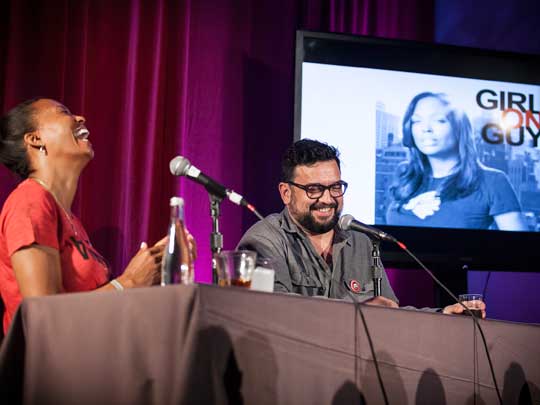 Girl on Guy live at LA Podfest 2015. L-to-R: Host Aisha Tyler with guest Horatio Sanz. Photo credit: Liezl Estipona.