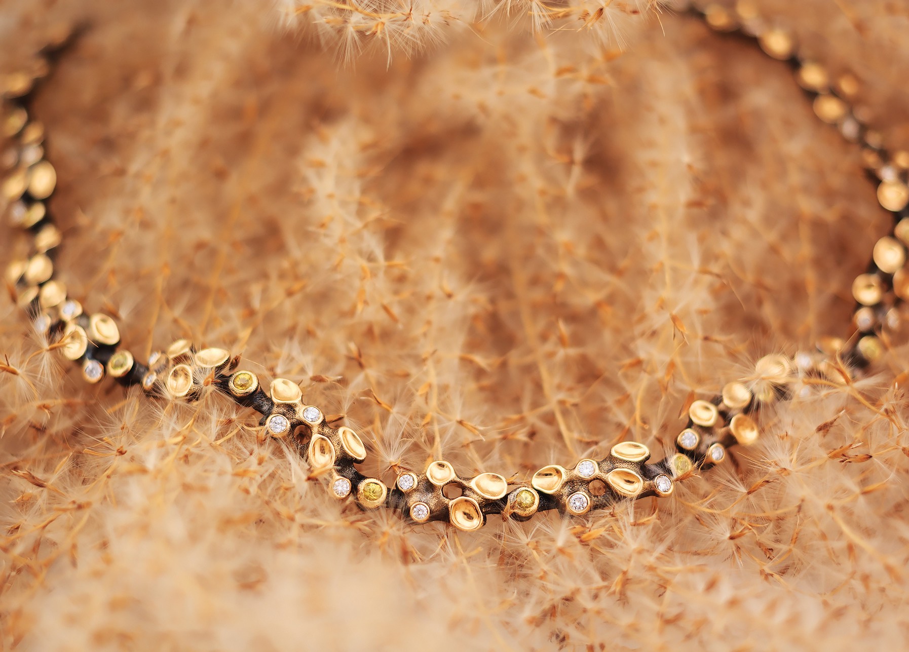 Wild Harvest. 18K yellow gold, white diamond and yellow sapphire necklace by Audrius Krulis