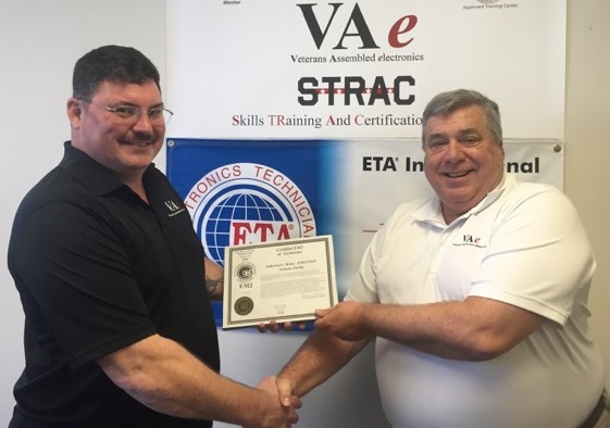 Brian C. Anderson is awarded the EF16@IWCE Veteran scholarship from John Shepard, Veterans Assembled electronics CEO.