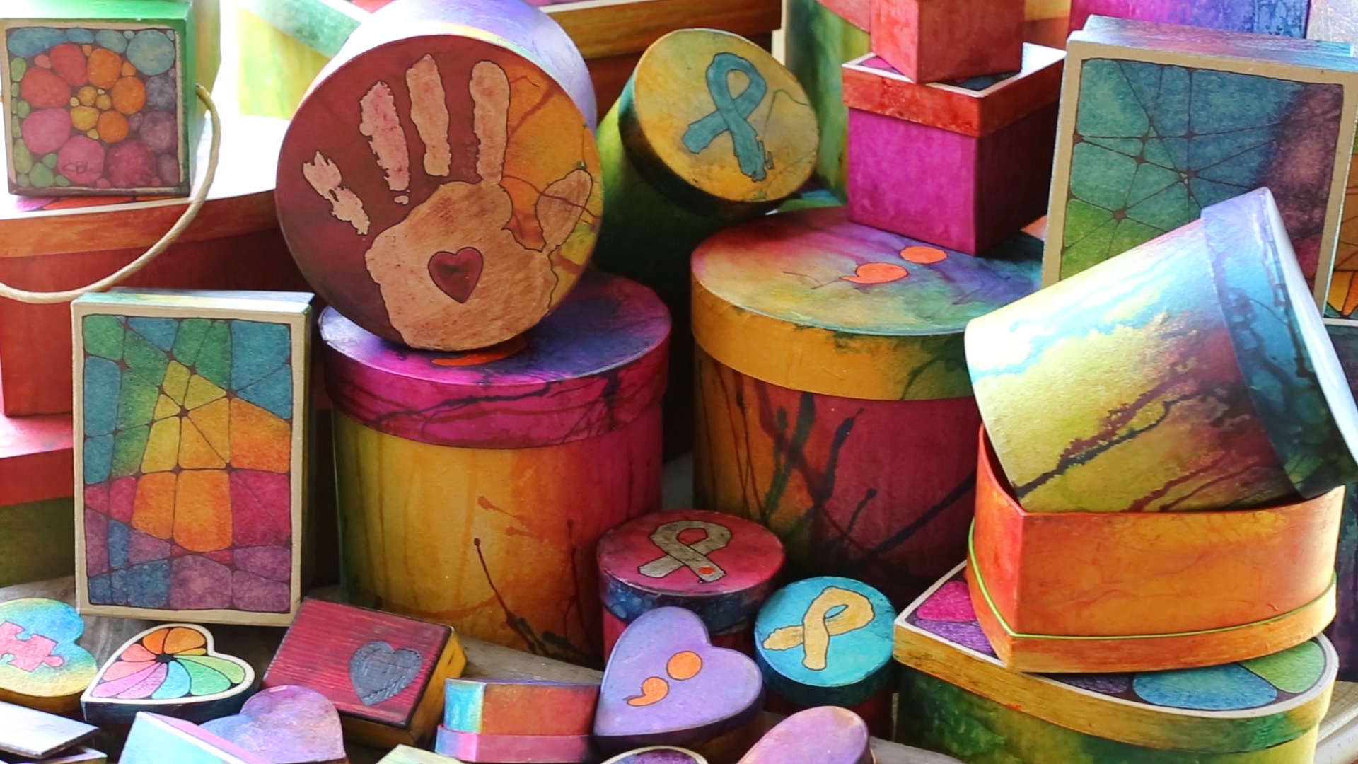 Artistic one-of-a-kind gift boxes spread awareness of timely causes.