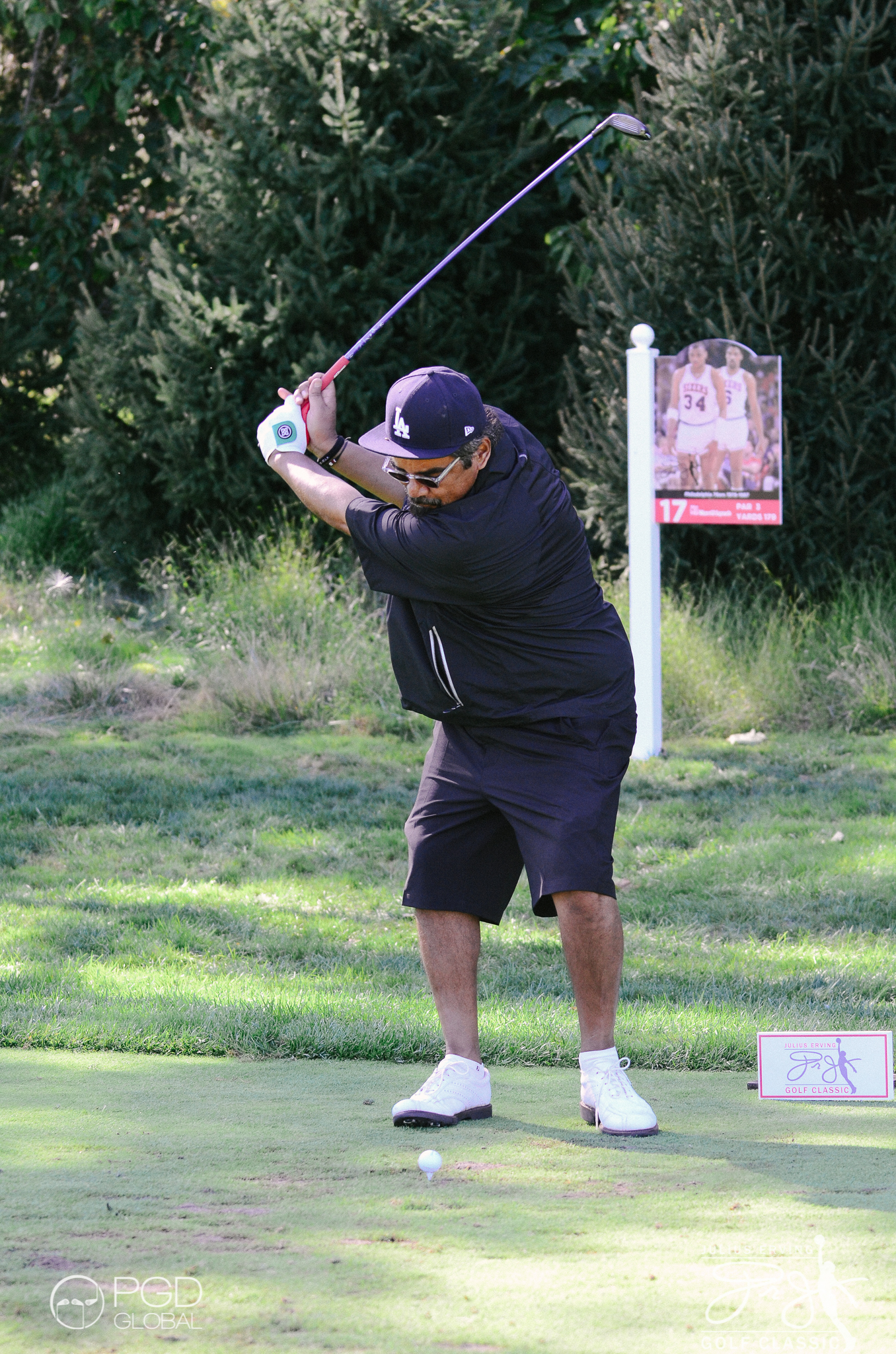 George Lopez takes an easy back swing at the 2015 Julius Erving Golf Classic in Philadelphia