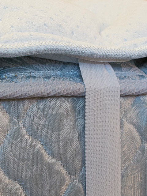 Elastic straps on both ends to hold the topper in place on the mattress.