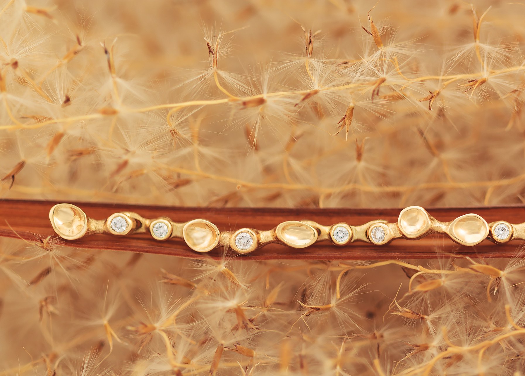 Dew Drops. 18K yellow gold and white diamond bracelet by Audrius Krulis