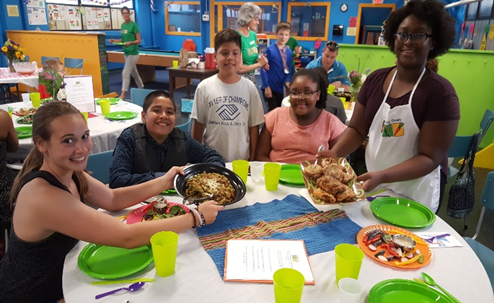 Waltham Boys and Girls Club members show off their healthy food choices