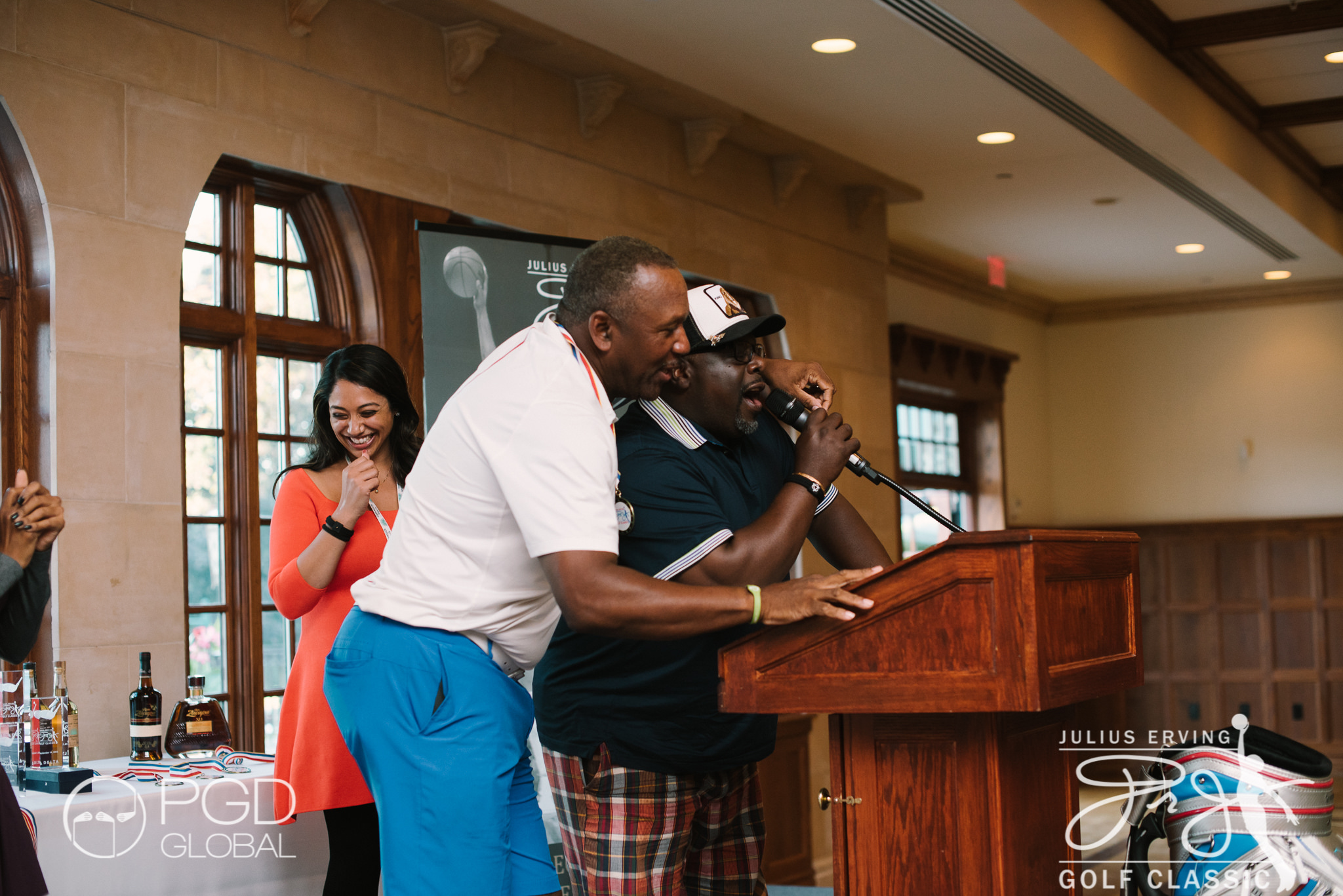 MLB Legend Joe Carter and Actor & Comedian Cedric The Entertainer entertain guests winning The 2015 Erving Classic Best Dressed Award.