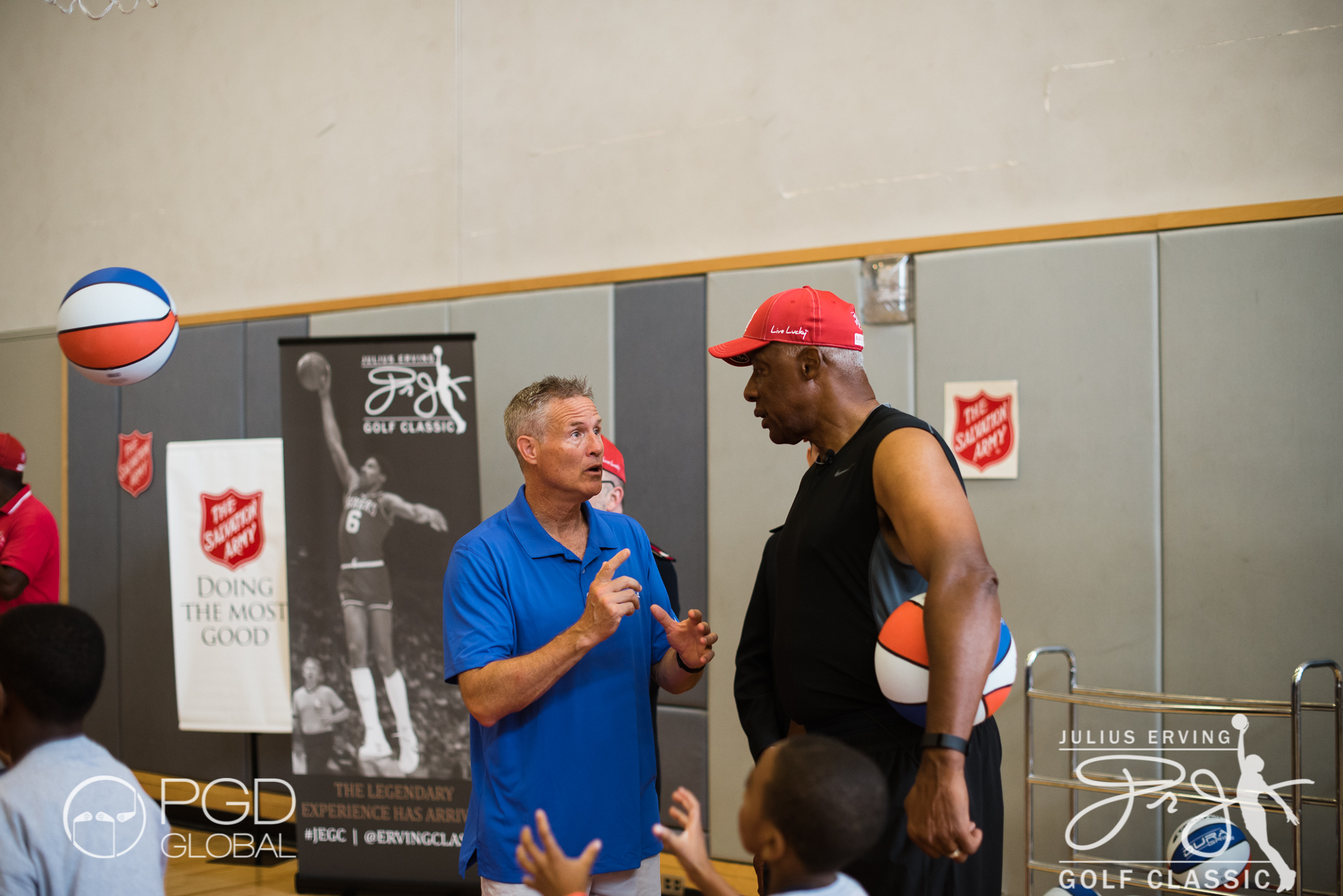 76ers Head Coach Brett Brown and Julius Erving preparing for the Erving Youth Clinic at The Salvation Army Kroc Center.