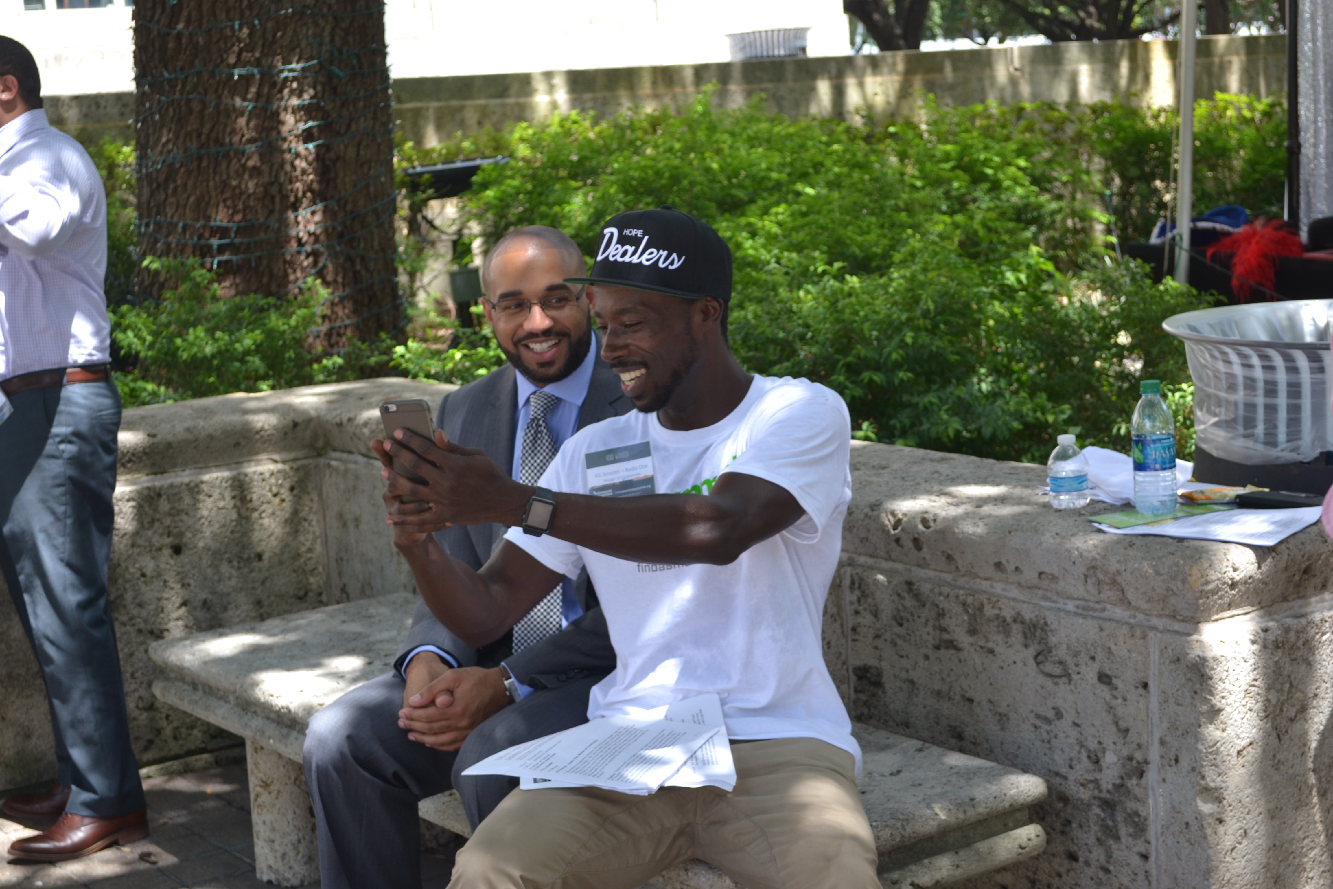 Radio One’s KG Smooth (right) emceed the Road Warriors Festival and snapped selfies with patrons, including H-GAC Assistant Director of Transportation Planning, Eulois Cleckley (left)