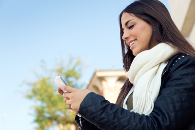 Girl Looking at Phone, Image courtesy of nenetus at FreeDigitalPhotos.net