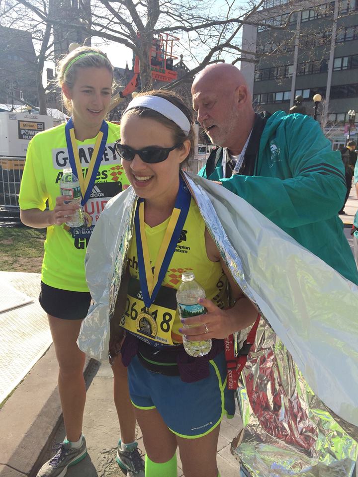 Leaning Ally College Success Program Mentor Coordinator Abigail Lanier after finishing the Boston Marathon