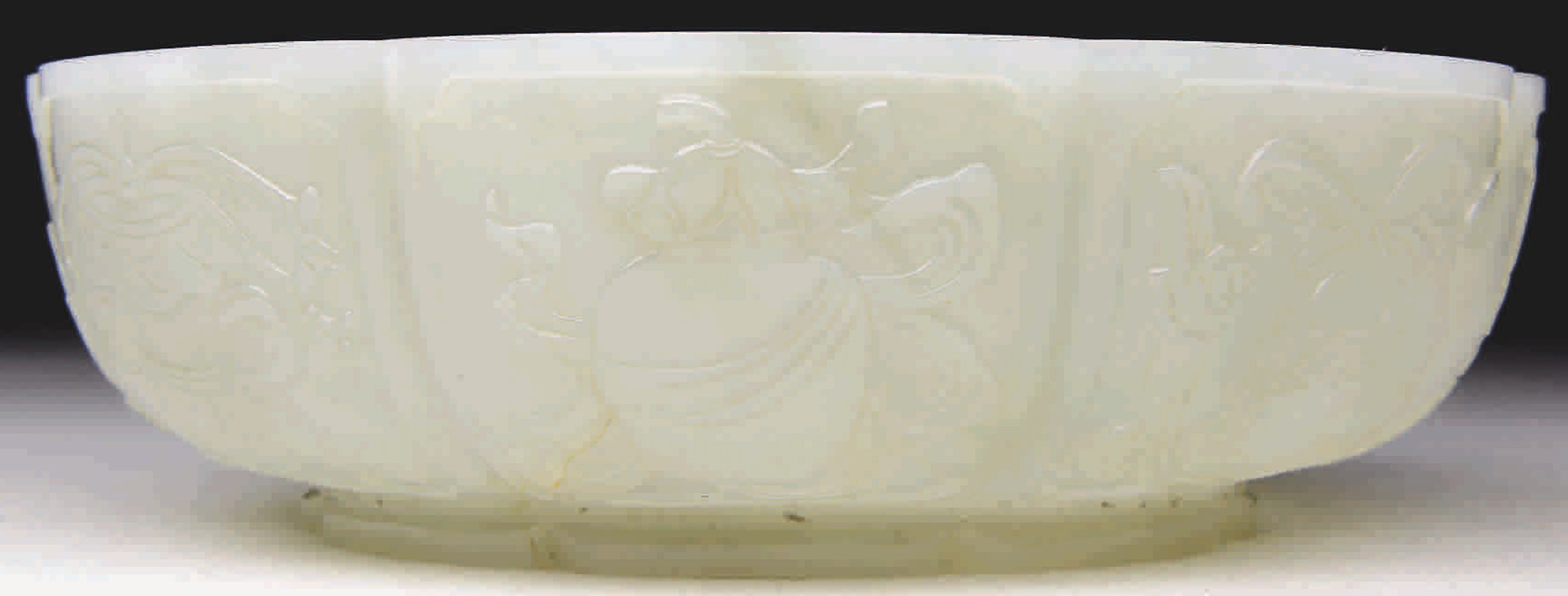 A Fine Carved Jade Shallow Bowl Realized $31,995.