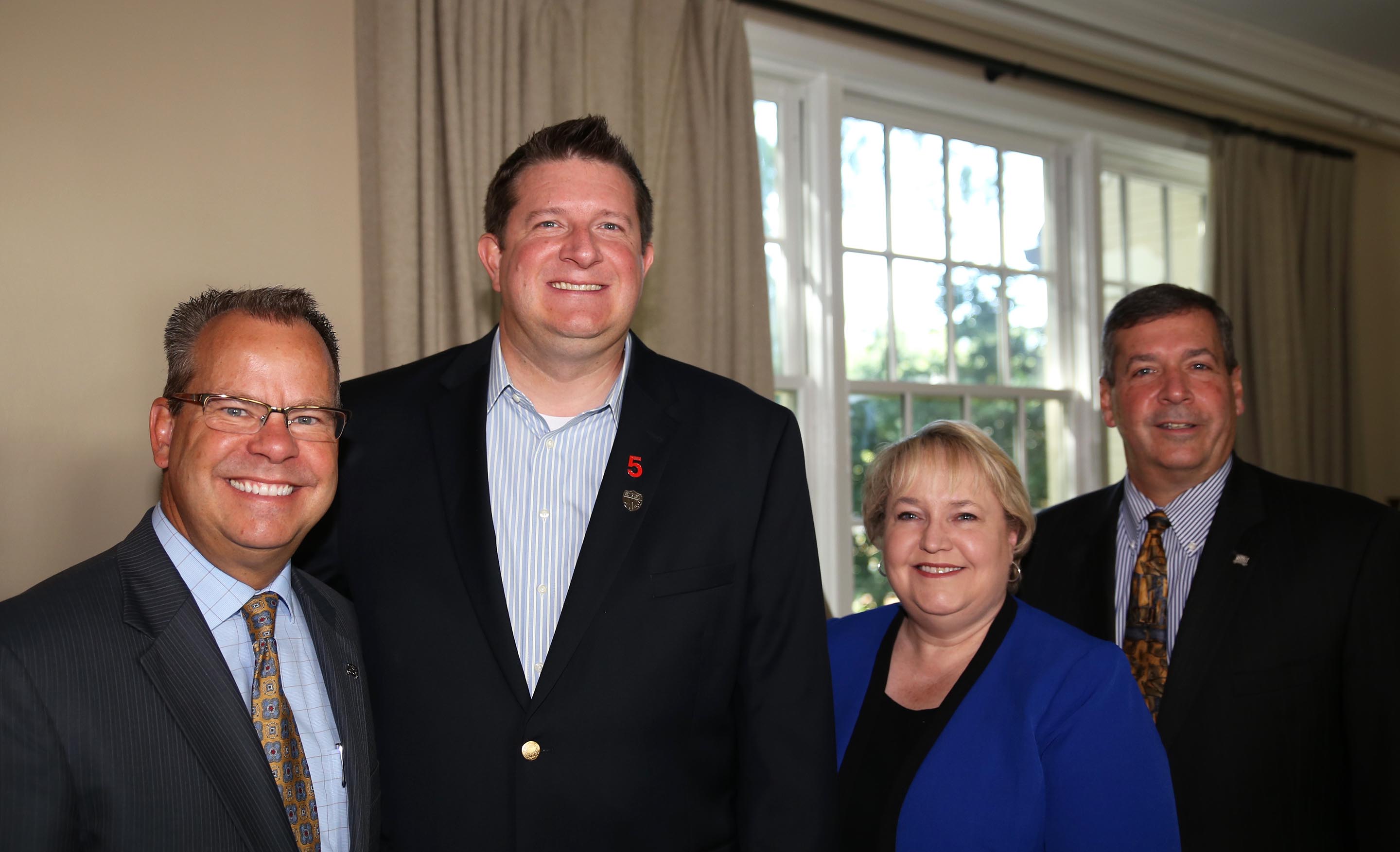 From left, UWG President Dr. Kyle Marrero, Cane Bay Partners VI Co-Founder David A. Johnson, UWG Richards College of Business Dean Dr. Faye McIntyre, UWG Vice President of University Advancement Dave